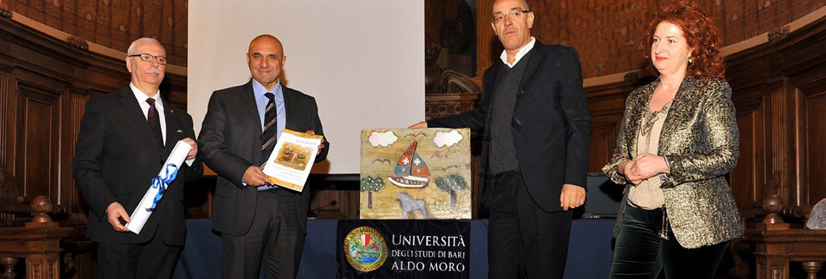 The awarding of Andrea Benetti in the Aula Magna of the University of Bari in the presence of the Magnificent Rector